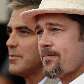Brad Pitt e George Clooney posam para fotógrafos na chegada ao 65.º Festival de Cinema de Veneza