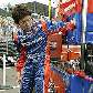 Hideki Mutoh, do Japão, se aquece antes de treino livre da F-Indy Hideki Mutoh, do Japão, se aquece antes de treino livre da F-Indy
