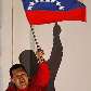O Presidente Venezuelano, Hugo Chávez, vence o referendo que lhe dá direito à reeleição ilimitada.