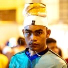 Conheça como funciona o imenso mercado a céu aberto de Belém Arte & Lazer - Para suportar o peso, os carregadores de peixe improvisam acolchoados de pano ou isopor amarrados ao rosto como se fossem chapéus de festa infantil achatados. São as rodilhas - Foto: Julia Rettmann/AE