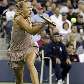 Dinamarquesa Caroline Wozniacki rebate bola durante a final do US Open Dinamarquesa Caroline Wozniacki rebate bola durante a final do US Open