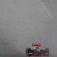 Jenson Button acelera seu McLaren sob chuva durante o GP da China de Fórmula 1, em Xangai Jenson Button acelera seu McLaren sob chuva durante o GP da China de Fórmula 1, em Xangai