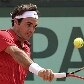 Federer se posiciona para devolver bola de Nadal Federer se posiciona para devolver bola de Nadal