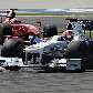 Robert Kubica, da BMW, passa à frente de Kimi Raikkonen, da Ferrari