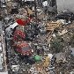 Ruas de um shopping tem aglomeração de veículos, em Kamaishi