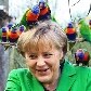 Merkel alimenta pássaros na Alemanha Merkel alimenta pássaros na Alemanha