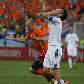 Lamento do eslovaco Hamsik, enquanto o holandês Robben comemora seu gol Lamento do eslovaco Hamsik, enquanto o holandês Robben comemora seu gol