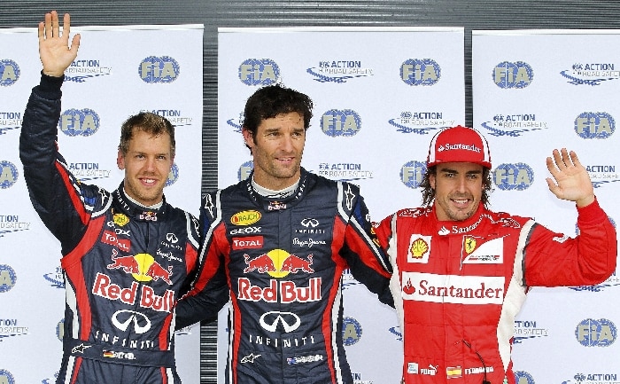Vettel (2.º), Webber (pole) e Alonso (3.º), a turma da frente do GP da Grã-Bretanha de F1, acena