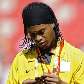 Ronaldinho Gaúcho observa sua medalha de bronze dos Jogos Olímpicos Ronaldinho Gaúcho observa sua medalha de bronze dos Jogos Olímpicos