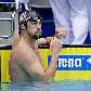 Michael Phelps reage após ver que chegou em terceiro lugar nos 100 m na Copa do Mundo