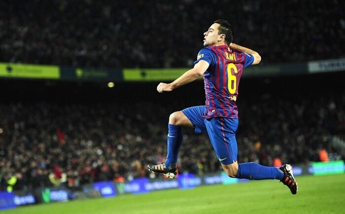 Xavi comemora o segundo gol do Barcelona sobre o Valencia