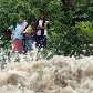 Moradores de Flor del Campo observam seu bairro ser inundado pelo Rio Choluteca, em Honduras Moradores de Flor del Campo observam seu bairro ser inundado pelo Rio Choluteca, em Honduras