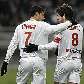 Ederson e Juninho Pernambucano comemoram gol para o Lyon