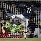Muslera defende pênalti de Tevez e garante classificação do Uruguai na Copa América Muslera defende pênalti de Tevez e garante classificação do Uruguai na Copa América