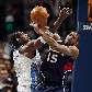 O brasileiro Nenê, do Denver Nuggets, disputa a bola com Al Horford, do Atlanta Hawks