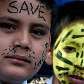 Salvem os tigres do Nepal: criançasse pintam para conscientizar da conservação do felino Salvem os tigres do Nepal: criançasse pintam para conscientizar da conservação do felino