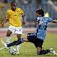 Alex Teixeira, do Brasil, tenta passar por Cabrera, do Uruguai, no Mundial sub-20 Alex Teixeira, do Brasil, tenta passar por Cabrera, do Uruguai, no Mundial sub-20