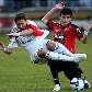 Keirrison sofre marcação de Rafael Santos no empate em Curitiba