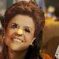 Eleitora usa máscara da Presidente Dilma Rousseff, em São Paulo