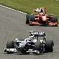Kazuki Nakajima passa à frente de Kimi Raikkonen ao final da primeira volta