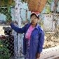 Mulher usa thanakha, cosmético feito de madeira que é a marca registrada do país. Mulher usa thanakha, cosmético feito de madeira que é a marca registrada do país.