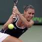 Flavia Pennetta em ação durante jogo em Miami Flavia Pennetta em ação durante jogo em Miami