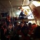 No interior do cruzeiro, passageiros se preparam para deixar a embarcação