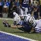 Austin Collie se estica todo para marcar o touchdown para o Indianapolis Colts