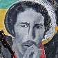 Em ronda, soldado passa por parede com o cantor Bob Marley pintado, na Jamaica