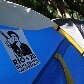 Panfleto fixado em barraca questiona a disposição de presidente Dilma Rousseff no evento