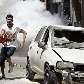Manifestantes ateiam fogo em carro no centro de São Paulo Manifestantes ateiam fogo em carro no centro de São Paulo