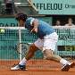 Roger Federer tenta, mas não consegue passar pelo sueco Robin Soderling em Roland Garros Roger Federer tenta, mas não consegue passar pelo sueco Robin Soderling em Roland Garros
