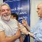 Lula e José Serra brincam no lançamento da campanha de vacinação contra gripe