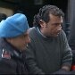 Francesco Schettino, capitão do navio, é levado pela polícia italiana