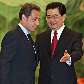 Francês Nicolas Sarkozy chega para almoço com Hu Jintao Francês Nicolas Sarkozy chega para almoço com Hu Jintao