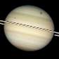 Essa imagem de Saturno foi tirada pelo Telescópio Hubble; ela mostra o trânsito de diversas luas Essa imagem de Saturno foi tirada pelo Telescópio Hubble; ela mostra o trânsito de diversas luas