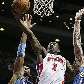 Rodney Stuckey, do Pistons, faz a bandeija contra a marcação do brasileiro Nenê, do Nuggets Rodney Stuckey, do Pistons, faz a bandeija contra a marcação do brasileiro Nenê, do Nuggets