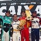 Max Wilson (macacão branco) comemora o título de campeão da Stock Car 2010, no pódio em Curitiba