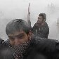 Manifestante ataca fotógrafo durante protesto contra educação policial em universidade da Turquia Manifestante ataca fotógrafo durante protesto contra educação policial em universidade da Turquia