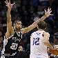 Tim Duncan, do Spurs, tenta impedir o passe de Nenad Krstic, do Oklahoma City Thunder Tim Duncan, do Spurs, tenta impedir o passe de Nenad Krstic, do Oklahoma City Thunder