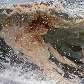 Ondas com petróleo chegam à costa da Praia Orange, no Alabama, EUA Ondas com petróleo chegam à costa da Praia Orange, no Alabama, EUA