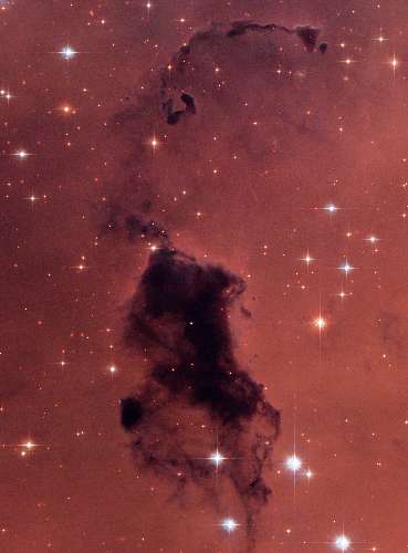 Imagem do Hubble mostra densos pontos de poeira e gás na Via Láctea chamados glóbulos Bok