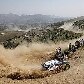 O campeão mundial de rali Sebastien Loeb contorna montanhas em Acrópolis, no Rali da Grécia O campeão mundial de rali Sebastien Loeb contorna montanhas em Acrópolis, no Rali da Grécia