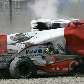 Heikki Kovalainen saiu da pista e bateu de frente na barreira de pneus, a mais de 200 km/h