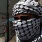 Jóvens seguram retrato do líder de Fatah durante marcha contra restrições aos palestinos Jóvens seguram retrato do líder de Fatah durante marcha contra restrições aos palestinos