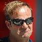 O brasileiro Rubens Barrichello faz cara feia em caminhada pelo paddock do circuito de Hungaroring