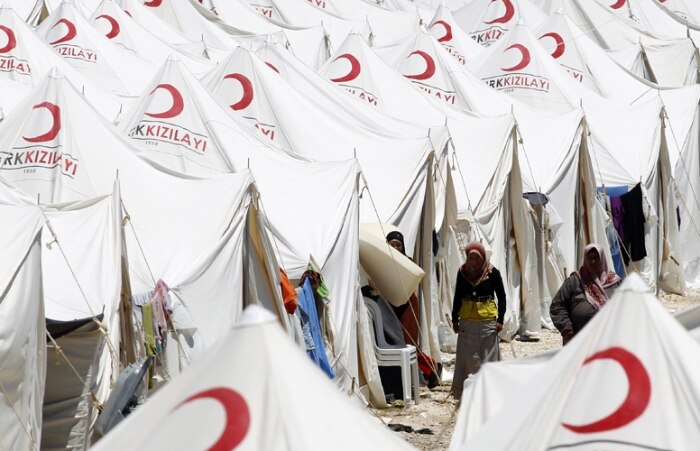 Refugiados sírios no acampamento na Turquia