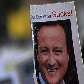 Protesto contra diminuição de despesa pública e o primeiro ministro David Cameron, na Inglaterra Protesto contra diminuição de despesa pública e o primeiro ministro David Cameron, na Inglaterra