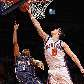 Danilo Gallinari, do New York Knicks, impede a cesta de Acie Law, do Charlotte Bobcats, na NBA Danilo Gallinari, do New York Knicks, impede a cesta de Acie Law, do Charlotte Bobcats, na NBA