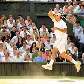Roger Federer em ação durante a final do Grand Slam de Wimbledon
